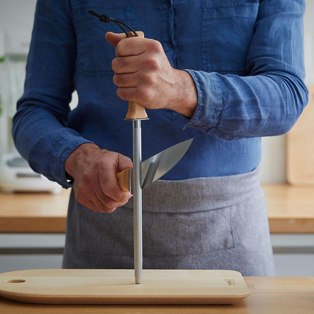 Ceramic sharpening rod in oak wood handle.