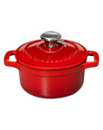 Chasseur Cast Iron Cocotte in ruby red on a white background.